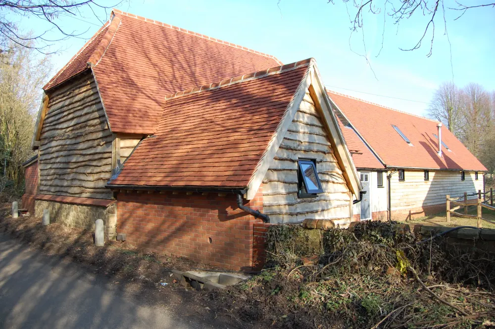 Grade II Listed Barn Conversion by Abode Architects in Farnham, Surrey