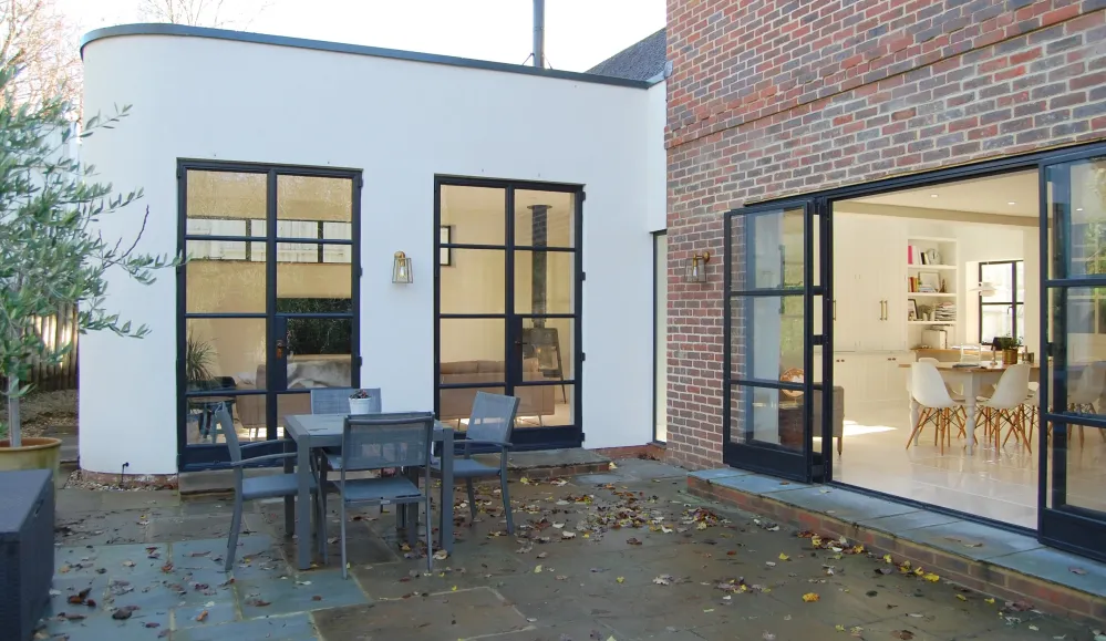 Art Deco House Extension by Abode Architects in Farnham, Surrey